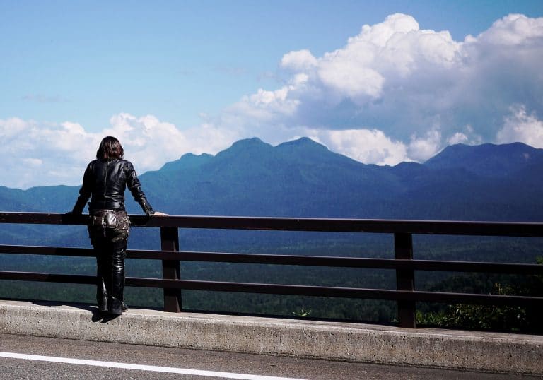 Japanese female motorcylist in leathers