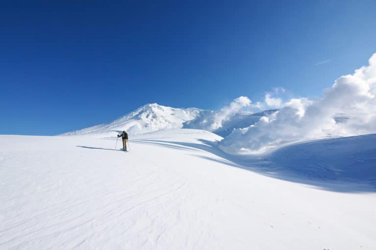 Ski touring around Mt. Asahidake steam vent fumeroles in Hokkaido, Japan