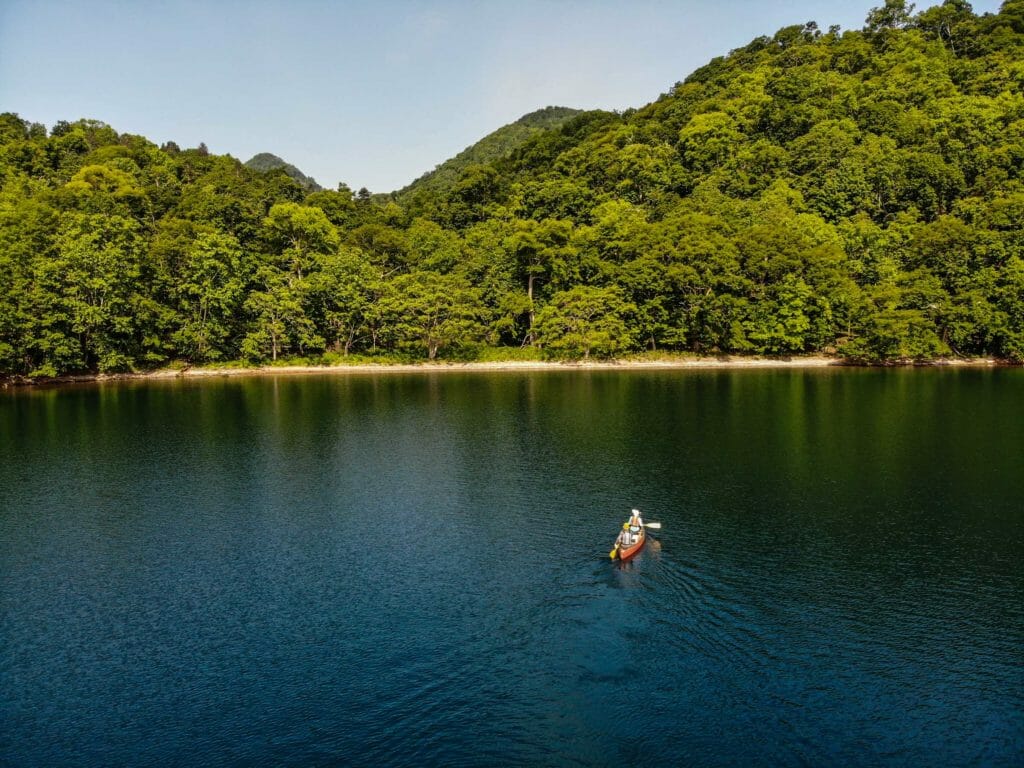 Canoeing around the Center Island of Lake Toya in Hokkaido, Japa